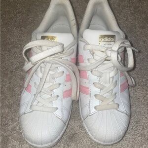 Pink white and gold adidas sneakers